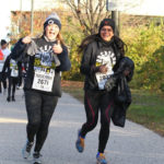 2 people running in the Rocky Run November 9, 2019